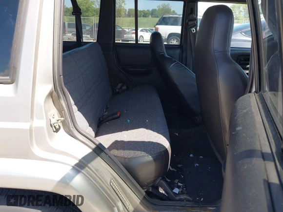 2001 Jeep Cherokee Sport with VIN 1J4FF48SX1L568532, listed as a IAAI auction lot 42738398 with 281,001 mi miles and . Bid and sale history available at DreamBid. Image 8.
