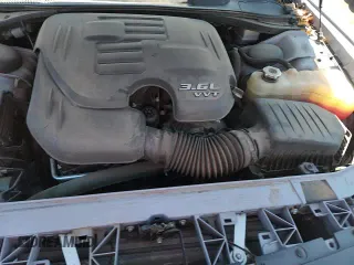 2021 Dodge Challenger SXT с VIN 2C3CDZAG1MH582424, выставлен на аукционе Copart как лот 70219745 с пробегом 64 465 миль миль и Списание • Salvage title. История ставок и продаж доступна на DreamBid. Изображение 15.