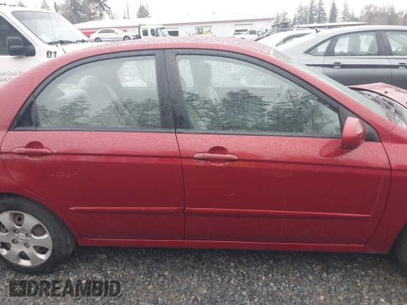 2009 Kia Spectra EX with VIN KNAFE222695621925, listed as a IAAI auction lot 40657622 with 135,647 mi miles. Bid and sale history available at carsss.com. Image 13.