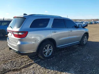 2014 Dodge Durango Limited with VIN 1C4SDJDT7EC349198, listed as a IAAI auction lot 40811926 with 258,652 mi miles. Bid and sale history available at carsss.com. Image 4.