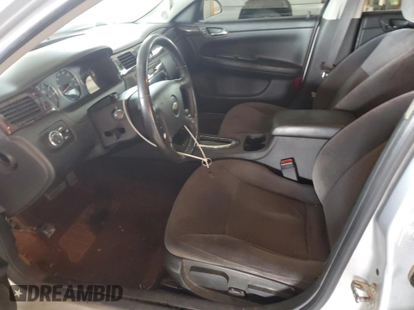 2014 Chevrolet Impala LT with VIN 2G1WB5E3XE1103306, listed as a Copart auction lot 63231005 with 163,901 mi miles and Salvage title. Bid and sale history available at DreamBid. Image 7.