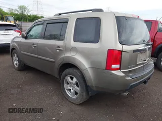 2011 Honda Pilot EX-L with VIN 5FNYF4H51BB076050, listed as a IAAI auction lot 42122883 with 143,288 mi miles and . Bid and sale history available at carsss.com. Image 3.
