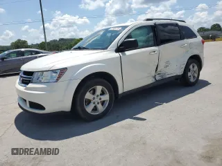 2013 Dodge Journey American Value with VIN 3C4PDCAB0DT575910, listed as a Copart auction lot 61989775 with 179,693 mi miles and Salvage title. Bid and sale history available at DreamBid. Image 1.