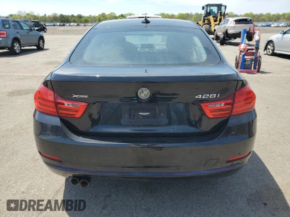 2015 BMW 4 Series 428i xDrive z VIN WBA4C9C56FD331197, wystawiony jako Copart lot #56714895 z przebiegiem 126 386 mil mil oraz Czysty tytuł • Clean title. Historia ofert i sprzedaży dostępna na DreamBid. Obrazek 6.
