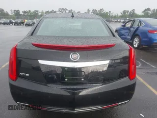 2013 Cadillac XTS Premium z VIN 2G61S5S39D9112491, wystawiony jako IAAI lot #42216373 z przebiegiem 145 338 mil mil oraz . Historia ofert i sprzedaży dostępna na DreamBid. Obrazek 16.