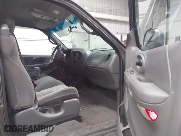2002 Ford F-150 XL with VIN 1FTRX18W92KA81797, listed as a IAAI auction lot 42250147 with 162,918 mi miles and . Bid and sale history available at DreamBid. Image 5.
