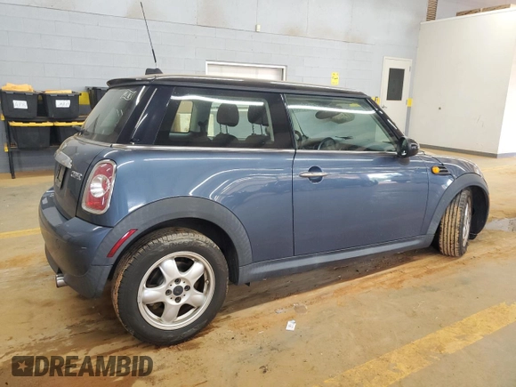 2011 MINI Hardtop with VIN WMWSU3C54BT184251, listed as a Copart auction lot 59298135 with 123,864 mi miles and Salvage title. Bid and sale history available at DreamBid. Image 3.