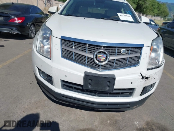 2011 Cadillac SRX Turbo Premium Collection with VIN 3GYFNKE68BS532056, listed as a IAAI auction lot 42447059 with 104,969 mi miles and . Bid and sale history available at DreamBid. Image 6.