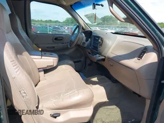 1999 Ford F-150 XL с VIN 2FTRX18LXXCA38121, выставлен на аукционе IAAI как лот 42758364 с пробегом 131 085 миль миль и . История ставок и продаж доступна на DreamBid. Изображение 5.