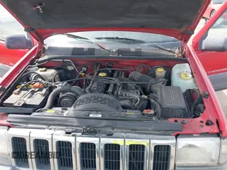 1996 Jeep Grand Cherokee Laredo with VIN 1J4FX58S4TC346218, listed as a IAAI auction lot 41943268 with 138,431 mi miles and . Bid and sale history available at DreamBid. Image 10.