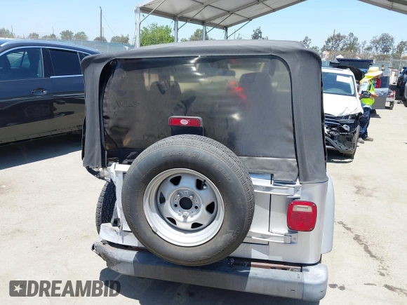 2004 Jeep Wrangler SE with VIN 1J4FA29134P715165, listed as a IAAI auction lot 42297821 with 109,397 mi miles and . Bid and sale history available at DreamBid. Image 17.