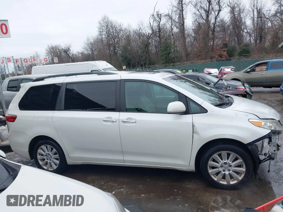 2015 Toyota Sienna Ltd with VIN 5TDDK3DC9FS115784, listed as a IAAI auction lot 41355934 with 125,675 mi miles. Bid and sale history available at carsss.com. Image 13.