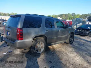 2008 Chevrolet Tahoe 1LT z VIN 1GNFC13048R216130, wystawiony jako IAAI lot #42020994 z przebiegiem 300 721 mil mil oraz . Historia ofert i sprzedaży dostępna na DreamBid. Obrazek 4.