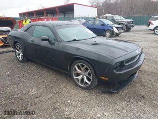 2009 Dodge Challenger SE with VIN 2B3LJ44V79H534470, listed as a IAAI auction lot 41840929 with NaN miles. Bid and sale history available at carsss.com. Image 1.