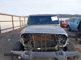 2018 Jeep Wrangler Unlimited Sport S z VIN 1C4HJXDG1JW183052, wystawiony jako IAAI lot #41372557 z przebiegiem 56 076 mil mil oraz . Historia ofert i sprzedaży dostępna na DreamBid. Obrazek 13.