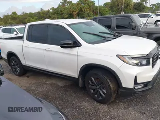 2023 Honda Ridgeline Sport z VIN 5FPYK3F14PB049364, wystawiony jako IAAI lot #40474507 z przebiegiem Nie podano mil oraz . Historia ofert i sprzedaży dostępna na DreamBid. Obrazek 13.