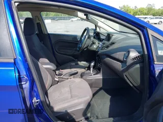 2014 Ford Fiesta SE with VIN 3FADP4BJ5EM190009, listed as a IAAI auction lot 42036976 with 157,575 mi miles. Bid and sale history available at carsss.com. Image 5.