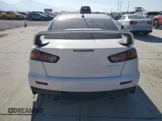 2015 Mitsubishi Lancer Evolution GSR with VIN JA32W8FV4FU024603, listed as a Copart auction lot 74699914 with 81,311 mi miles and Salvage Title. Bid and sale history available at carsss.com. Image 6.