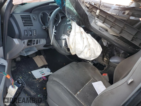 2013 Toyota Tacoma PreRunner z VIN 3TMJU4GN2DM142113, wystawiony jako Copart lot #59042115 z przebiegiem 155 687 mil mil oraz Szkoda całkowita • Salvage title. Historia ofert i sprzedaży dostępna na DreamBid. Obrazek 8.