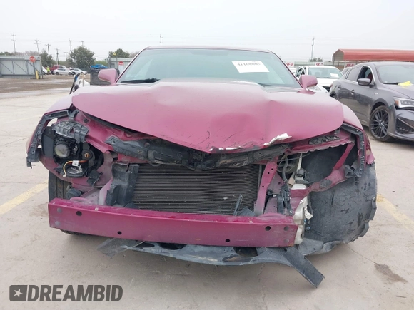 2014 Chevrolet Camaro LT z VIN 2G1FC1E3XE9317459, wystawiony jako IAAI lot #41168805 z przebiegiem 126 298 mil mil oraz . Historia ofert i sprzedaży dostępna na DreamBid. Obrazek 13.