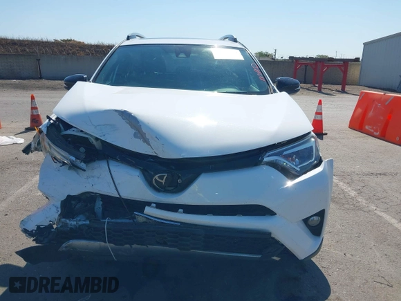2017 Toyota RAV4 SE with VIN 2T3JFREV0HW609611, listed as a IAAI auction lot 42618053 with 85,915 mi miles and . Bid and sale history available at DreamBid. Image 12.