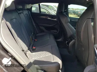 2022 BMW X4 M z VIN 5YM23EC01N9M75627, wystawiony jako Copart lot #52940744 z przebiegiem Nie podano mil oraz . Historia ofert i sprzedaży dostępna na DreamBid. Obrazek 11.