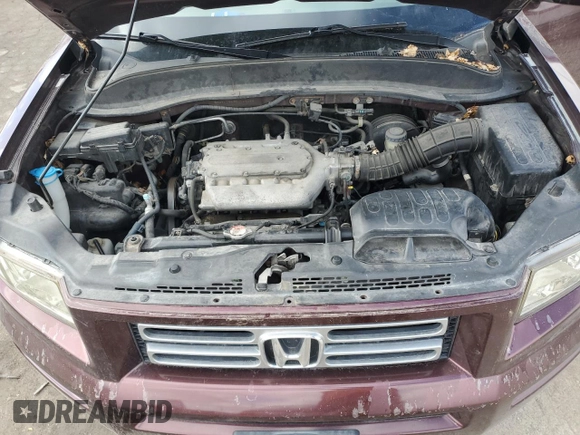 2007 Honda Ridgeline RTL z VIN 2HJYK16547H527465, wystawiony jako Copart lot #47943765 z przebiegiem 205 927 mil mil oraz Tytuł czysty. Historia ofert i sprzedaży dostępna na DreamBid. Obrazek 11.