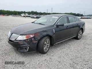 2011 Lincoln MKS with VIN 1LNHL9DR5BG606827, listed as a Copart auction lot 59988445 with 124,124 mi miles and Salvage title. Bid and sale history available at DreamBid. Image 1.