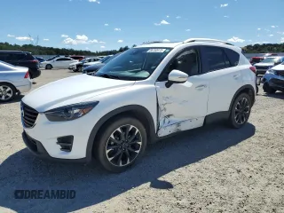 2016 Mazda CX-5 Grand Touring z VIN JM3KE4DYXG0868512, wystawiony jako Copart lot #56763475 z przebiegiem 65 390 mil mil oraz Szkoda całkowita • Salvage title. Historia ofert i sprzedaży dostępna na DreamBid. Obrazek 1.