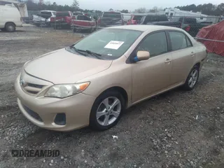2011 Toyota Corolla L with VIN 2T1BU4EE3BC649924, listed as a IAAI auction lot 41051077 with 223,379 mi miles. Bid and sale history available at carsss.com. Image 2.