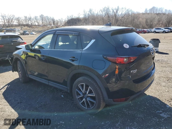 2017 Mazda CX-5 Grand Touring with VIN JM3KFBDL6H0211374, listed as a Copart auction lot 49079775 with 142,164 mi miles and Salvage Title. Bid and sale history available at carsss.com. Image 2.