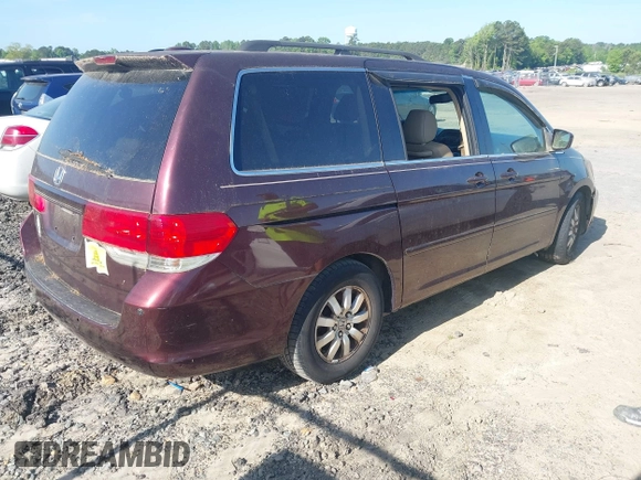 2009 Honda Odyssey EX-L with VIN 5FNRL38699B402476, listed as a IAAI auction lot 42146268 with 189,106 mi miles. Bid and sale history available at carsss.com. Image 4.