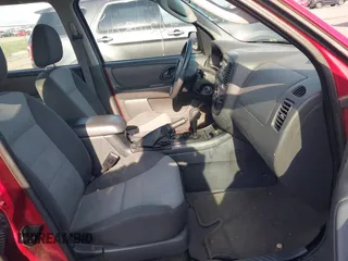 2005 Ford Escape XLS Value with VIN 1FMYU92Z25KA52633, listed as a IAAI auction lot 42210824 with 198,553 mi miles and . Bid and sale history available at DreamBid. Image 5.