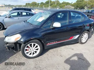 2008 Suzuki SX4 Convenience Pkg with VIN JS2YC415985102350, listed as a IAAI auction lot 41626643 with 210,929 mi miles. Bid and sale history available at carsss.com. Image 2.