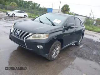 2013 Lexus RX 450h with VIN JTJZB1BA3D2006802, listed as a IAAI auction lot 42720067 with 117,291 mi miles and . Bid and sale history available at DreamBid. Image 2.