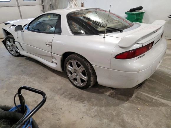 1996 Mitsubishi 3000GT VR-4 with VIN JA3AN74K7TY001306, listed as a Copart auction lot 87067954 with 145475 miles and Salvage Title. Bid and sale history available at carsss.com. Image 2.