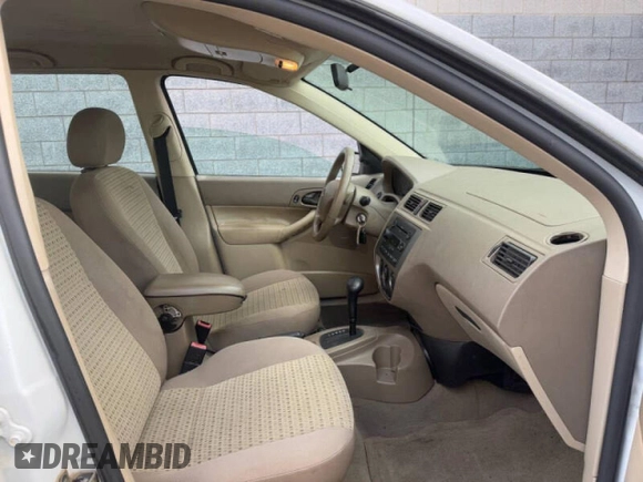 2005 Ford Focus SE with VIN 1FAFP36N65W234695, listed as a Copart auction lot 50022715 with 128,583 mi miles and Clean Title. Bid and sale history available at carsss.com. Image 5.