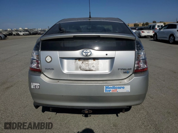 2005 Toyota Prius z VIN JTDKB20U557022396, wystawiony jako Copart lot #59750095 z przebiegiem 263 673 mil mil oraz Szkoda całkowita • Salvage title. Historia ofert i sprzedaży dostępna na DreamBid. Obrazek 6.