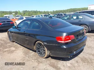 2009 BMW 3 Series 328i with VIN WBAWB33509P138474, listed as a IAAI auction lot 41992328 with 177,613 mi miles. Bid and sale history available at carsss.com. Image 3.