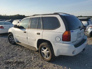 2004 GMC Envoy SLE with VIN 1GKDS13S542233286, listed as a Copart auction lot 76129164 with 228,981 mi miles and Salvage Title. Bid and sale history available at carsss.com. Image 2.
