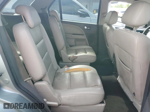 2008 Ford Taurus X SEL с VIN 1FMDK02WX8GA20610, выставлен на аукционе Copart как лот 55857005 с пробегом 320 530 миль миль и Списание • Salvage title. История ставок и продаж доступна на DreamBid. Изображение 11.