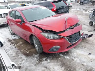 2016 Mazda Mazda3 i Grand Touring with VIN 3MZBM1N77GM245567, listed as a IAAI auction lot 41330883 with 128,423 mi miles. Bid and sale history available at carsss.com. Image 1.