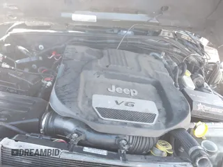 2015 Jeep Wrangler Unlimited Rubicon with VIN 1C4BJWFG0FL623431, listed as a IAAI auction lot 41651317 with 105,508 mi miles. Bid and sale history available at carsss.com. Image 10.