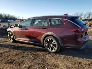 2018 Buick Regal Essence with VIN W04GV8SX1J1103765, listed as a Copart auction lot 49679465 with 142,920 mi miles and Salvage title. Bid and sale history available at DreamBid. Image 2.