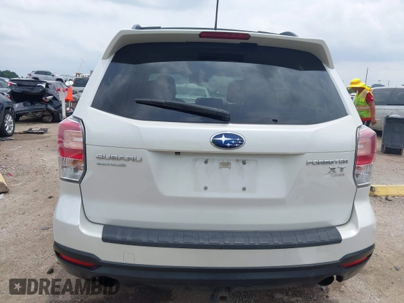2014 Subaru Forester XT Touring with VIN JF2SJGMC4EH555465, listed as a IAAI auction lot 42357371 with 168,378 mi miles and . Bid and sale history available at DreamBid. Image 17.