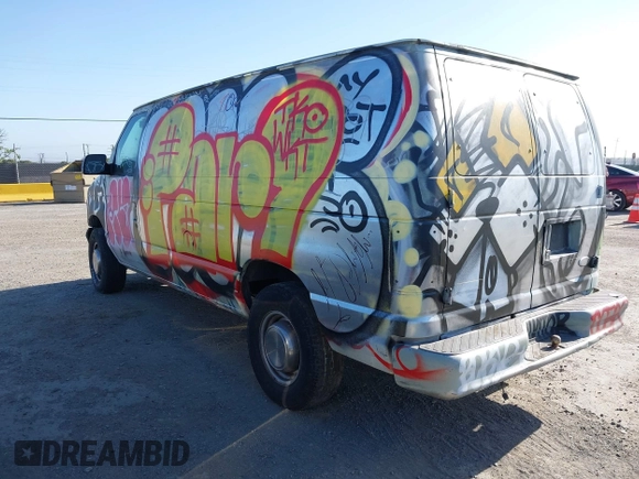 2002 Ford Econoline Cargo with VIN 1FTNE24L42HB67506, listed as a IAAI auction lot 42056517 with 197,394 mi miles and . Bid and sale history available at DreamBid. Image 3.