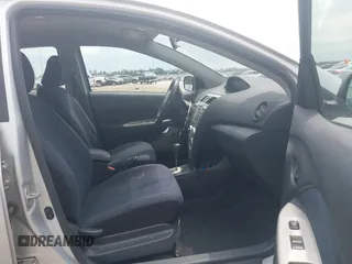 2008 Toyota Yaris with VIN JTDBT923184018720, listed as a IAAI auction lot 42038762 with 246,994 mi miles. Bid and sale history available at carsss.com. Image 5.