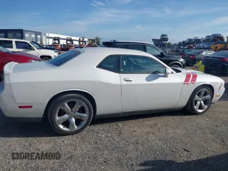 2014 Dodge Challenger R/T with VIN 2C3CDYBT6EH185590, listed as a IAAI auction lot 42536813 with 198,854 mi miles and . Bid and sale history available at DreamBid. Image 13.