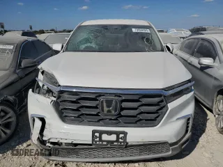 2024 Honda Pilot EX-L z VIN 5FNYG2H47RB006734, wystawiony jako Copart lot #78000524 z przebiegiem 23 960 mil mil oraz Szkoda całkowita • Salvage title. Historia ofert i sprzedaży dostępna na DreamBid. Obrazek 5.