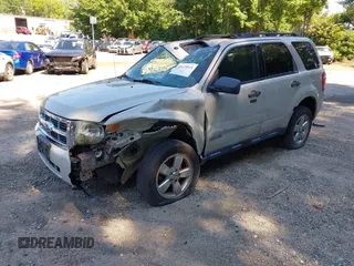 2008 Ford Escape XLT with VIN 1FMCU93198KE17879, listed as a IAAI auction lot 40125825 with 214,373 mi miles and . Bid and sale history available at DreamBid. Image 18.